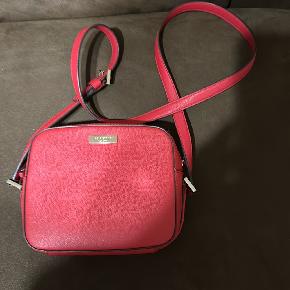 Kate Spade crossbody use only couple of tomes is in excellent condition.